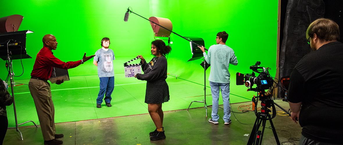 Students shown behind the scenes on a film shoot